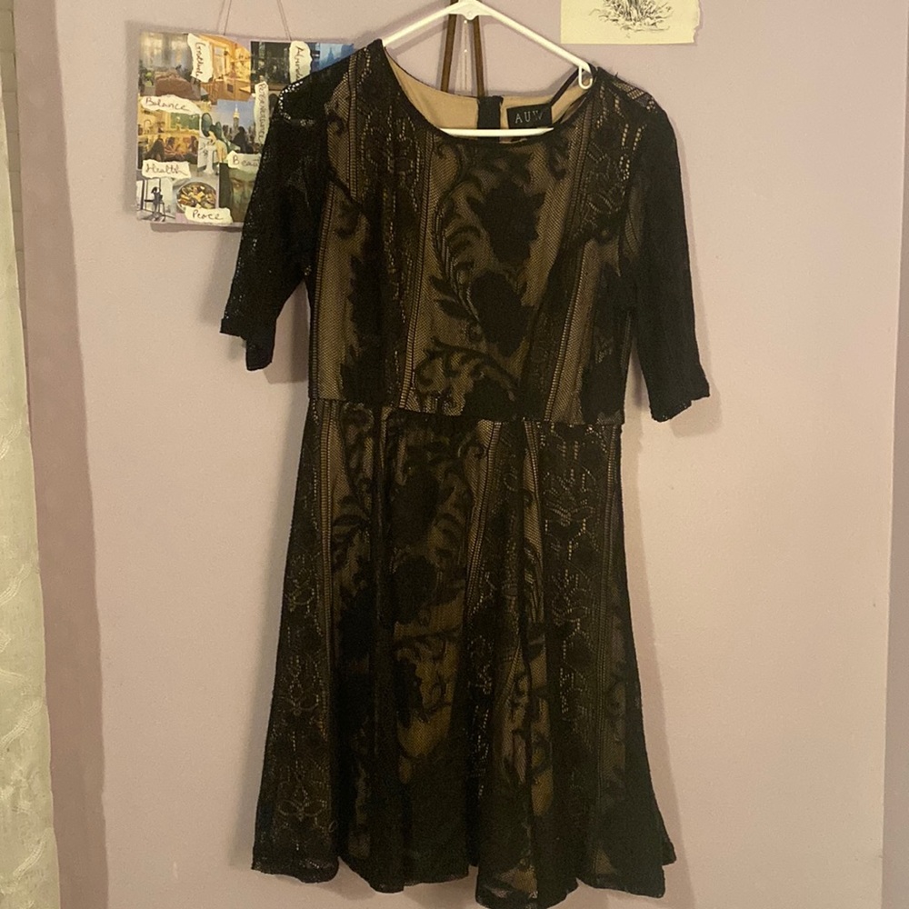 Black lace with nude interior mini dress with sleeves in size 12